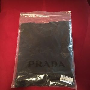 Prada logo Tee-shirt. Black. 2XL but fits like XL. Rear pocket with zipper. New.